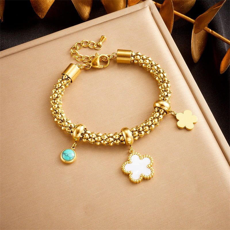 Bracciale alla moda vintage in acciaio inossidabile placcato oro con ciondolo a forma di fiore, luna, stella e turchese per donna