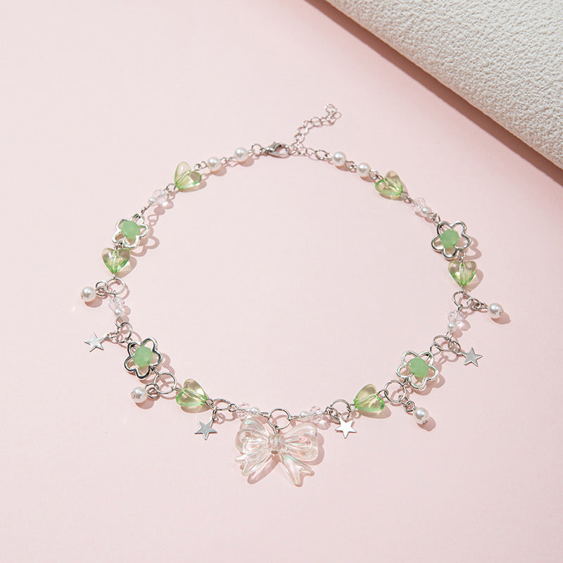 Collana con perline di vetro fatte a mano a forma di fiocco per bambine con ciondolo in lega, stile fresco e dolce