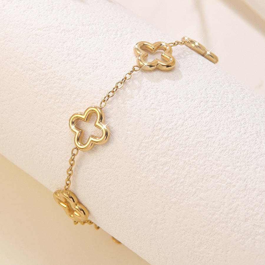 Elegante Bracciale Minimalista da Donna in Acciaio Inossidabile Placcato Oro con Zirconi e Quadrifoglio