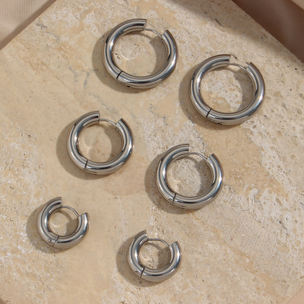 Minimalist Geometric Stainless Steel Hoop Earrings for Women with Silver Plated Finish and Diamond-Cut Faceting