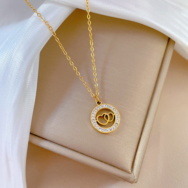 Minimalist Double Ring Heart-Shaped Titanium Steel Necklace with Gold Plating for Women and Men