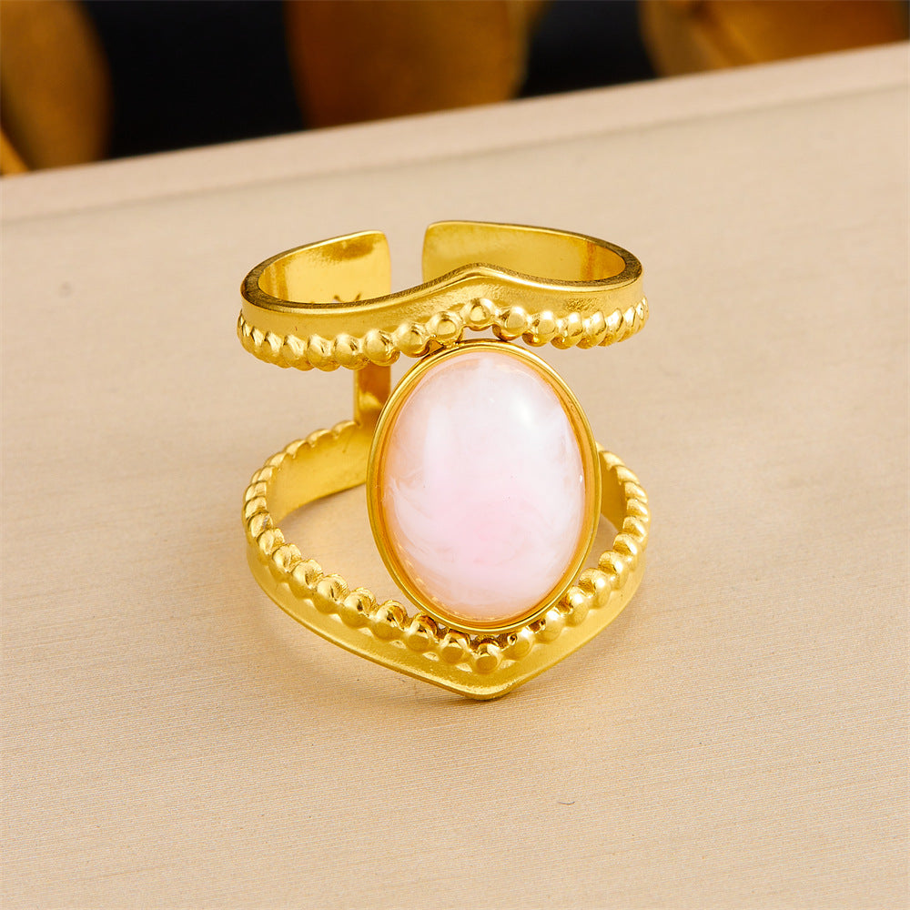 Anillo de acero inoxidable geométrico de estilo vintage con baño de oro de 18 quilates y detalle de corazón asimétrico para mujer