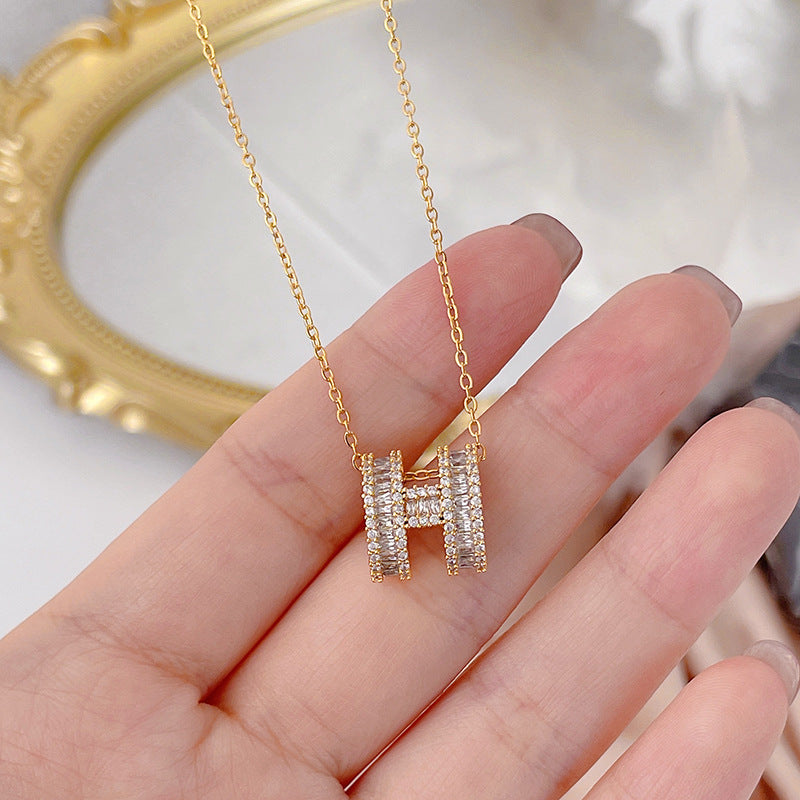 Luxury Minimalist Geometric Letter H Pendant Necklace for Women in Titanium Steel with Gold Plating, Wavy Chain Style