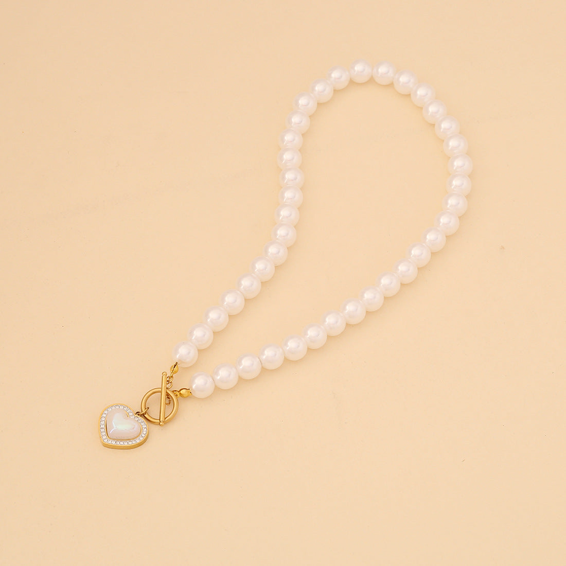 Collana alla moda in acciaio inossidabile a forma di cuore con perle simulate da donna