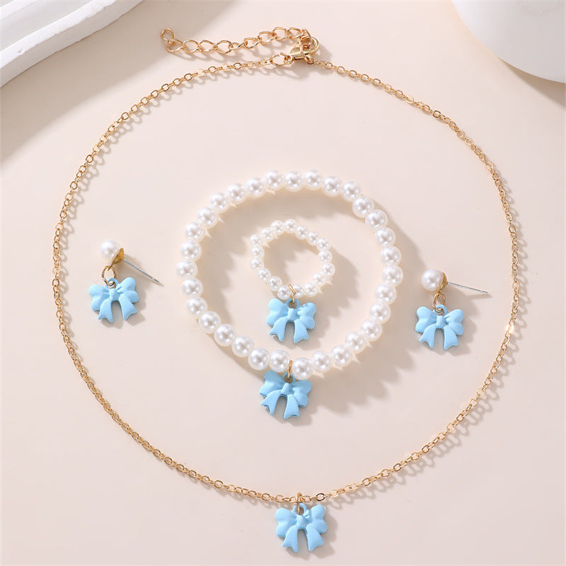 Conjunto de collar y pulsera de perlas dulces con colgante de lazo para niños en material de resina con acabado esmaltado