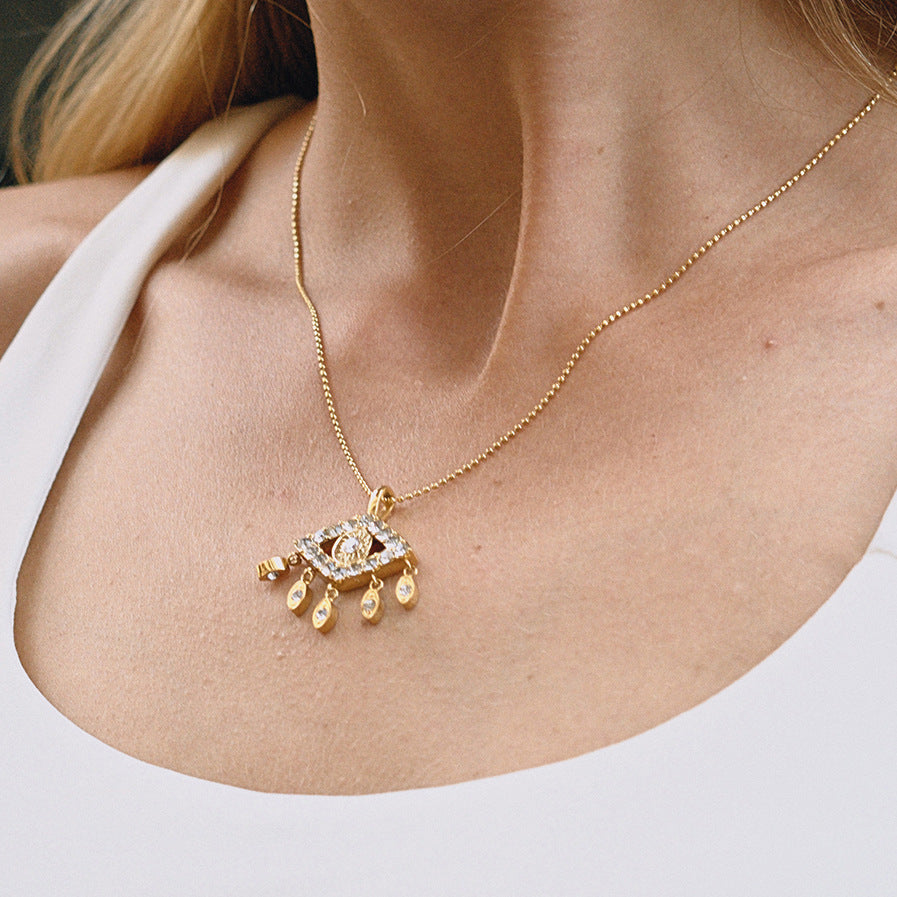 Collar con colgante de ojo demoníaco geométrico con borla de acero de titanio y diamantes de imitación, collar de moda de acero inoxidable galvanizado para mujer