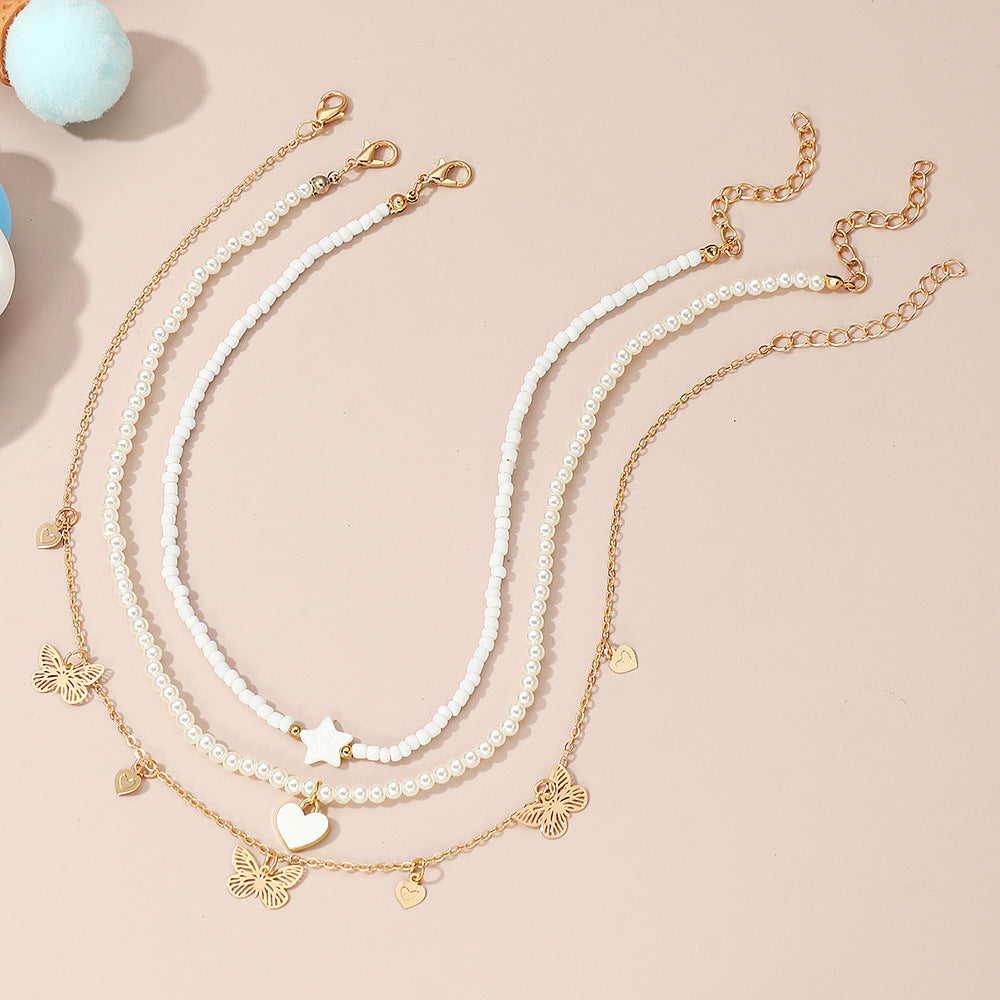 Set di collane con ciondoli a forma di cuore, farfalla e stella, da bambina, con ciondolo in lega e catena di perle in stile principessa