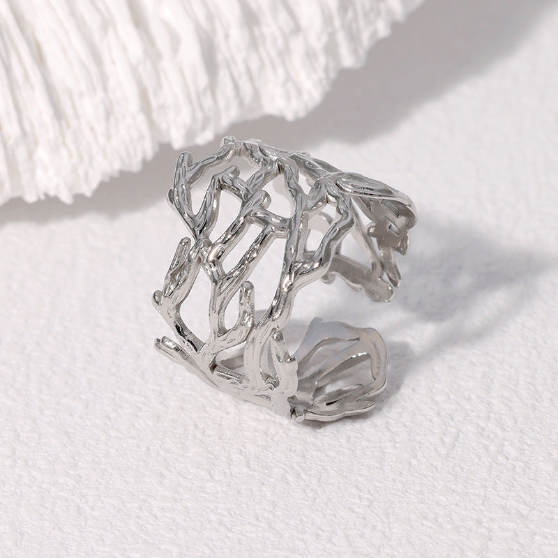 Irregular Hollow Wide Band Stainless Steel Ring for Women with Minimalist Cold-Tone Aesthetic and Open-Style Design
