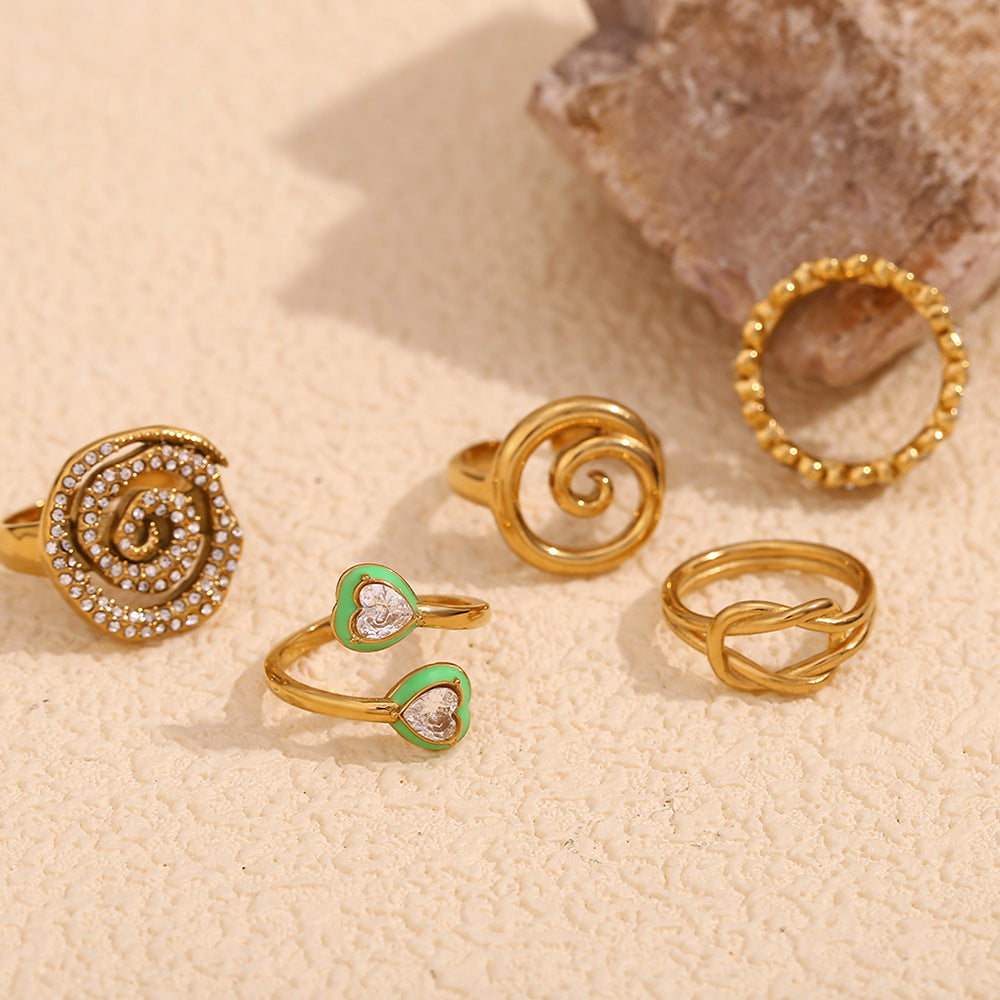 Minimalist Geometric Stainless Steel Ring with 18K Gold Plating, Swirl Knot and Daisy Accent for Women