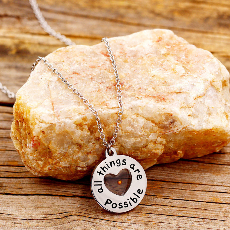 Natural Minimalist Round Engraved Mustard Seed Pendant Necklace in Stainless Steel with Titanium Steel Charm and Plated Finish