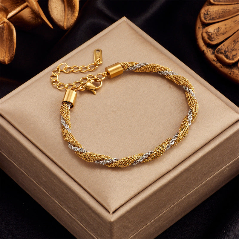 Minimalist Titanium Steel Twisted Dual-Tone Hollow Circle Bracelet for Men and Women