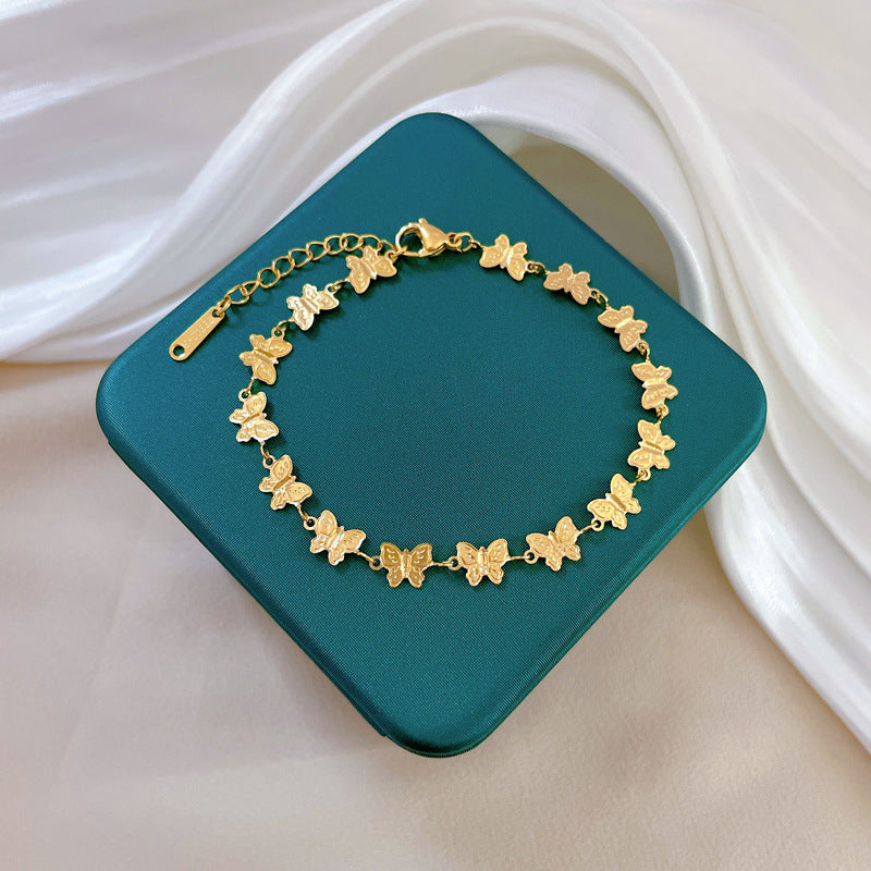 Bracciale vintage minimalista con farfalla in acciaio al titanio placcato oro per uomo e donna