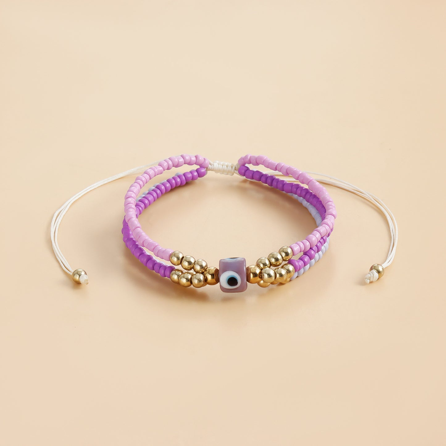 Elegante bracciale da donna in metallo galvanizzato a forma di occhio con intreccio di perline colorate