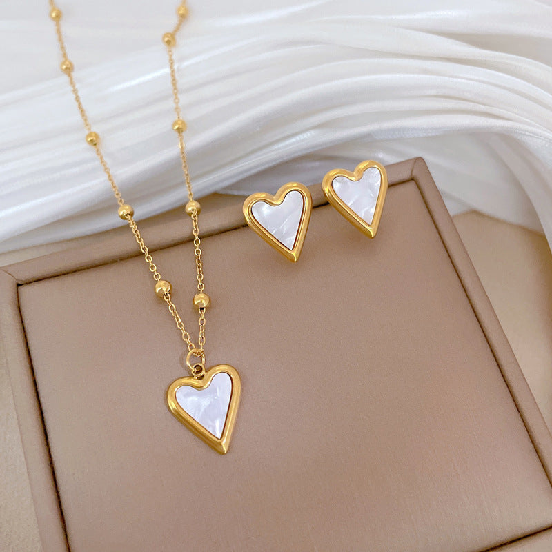 Collana con ciondolo a cuore minimalista in acciaio al titanio placcato oro per donna e uomo, stile medaglione a catena irregolare