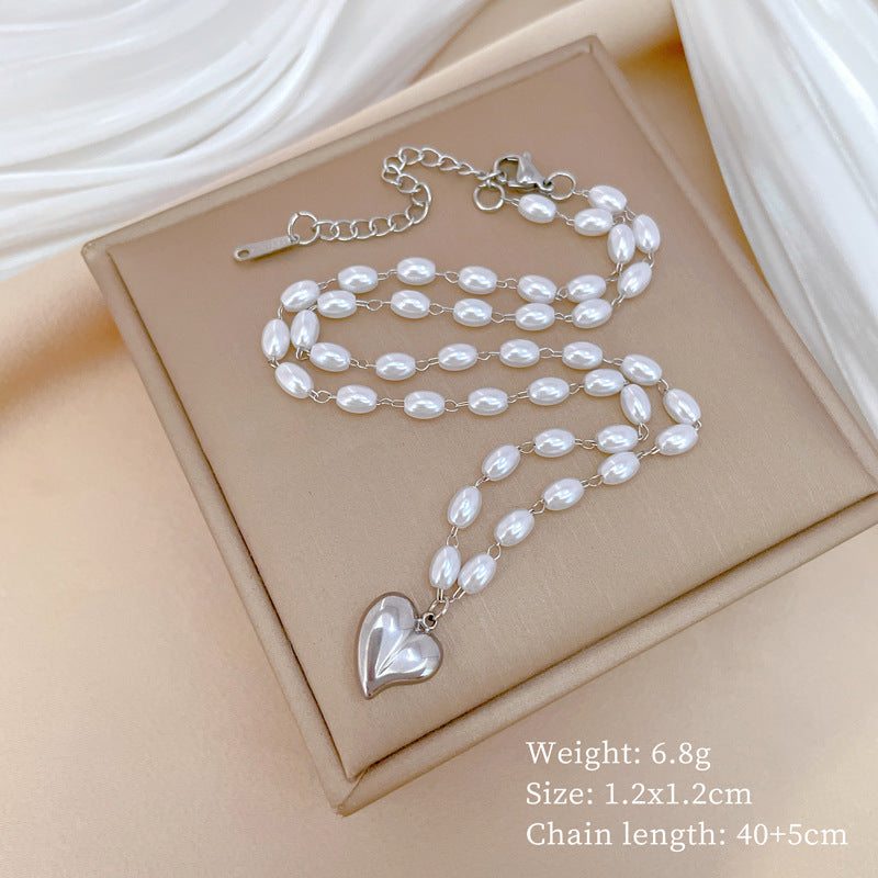 Collar con Colgante Geométrico de Corazón de Acero y Titanio Minimalista con Acento Floral