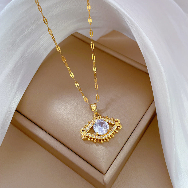 Collana da donna con ciondolo a occhio e ciglia geometrico in acciaio al titanio di lusso, con intarsi in strass, catena regolabile in acciaio al titanio