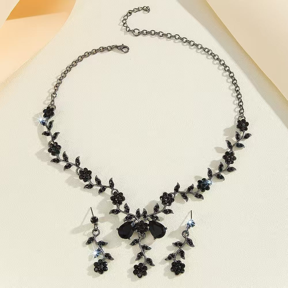 Exaggerated Floral Rhinestone and Crystal Necklace and Earring Set with Cross Chain