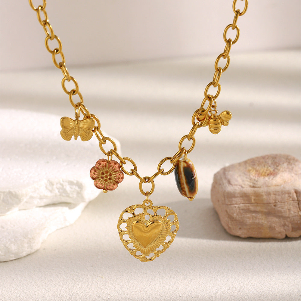 Luxury Vintage Hollow Heart Pendant Necklace in Stainless Steel with 18K Gold Plating on O-Chain