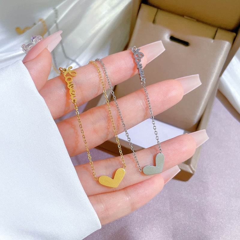 Collar con colgante de corazón de acero de titanio minimalista para mujer con baño de oro, diseño geométrico, delicada cadena de clavícula