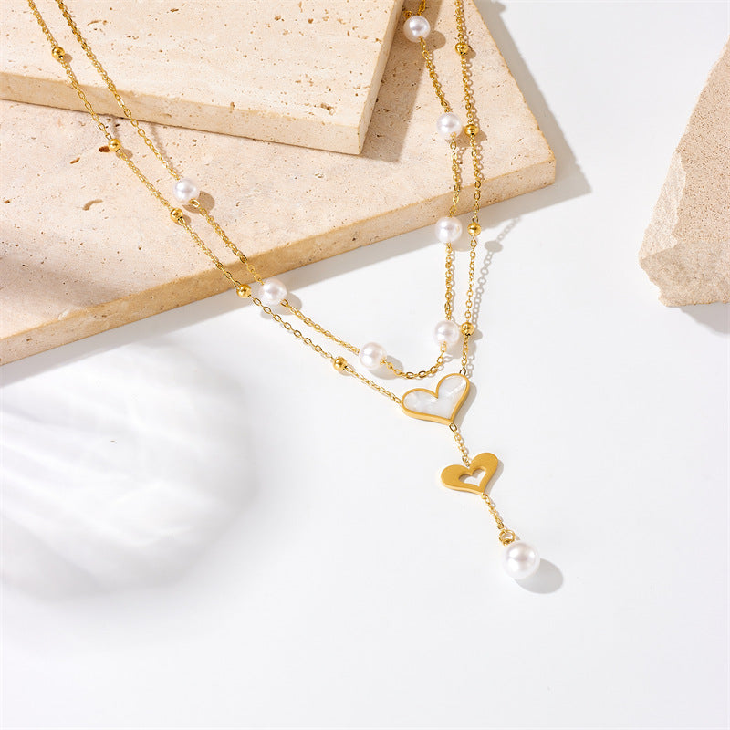 Vintage-Style Double-Layer Pendant Necklace with Pearl and Butterfly Charm, Stainless Steel Chain with Tassel Accents and Plated Finish