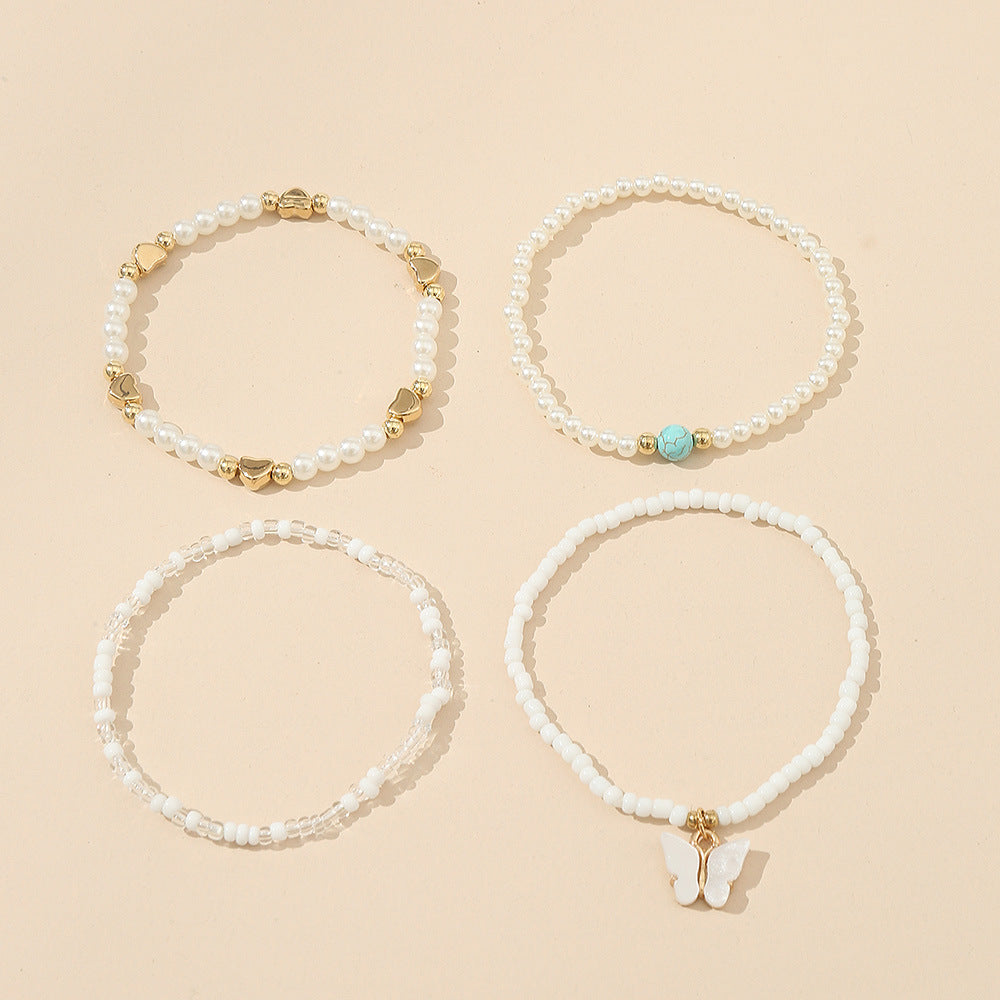 Tobillera de Perlas en Forma de Mariposa Minimalista para Niñas con Diseño Tejido a Mano y Acento de Estrella