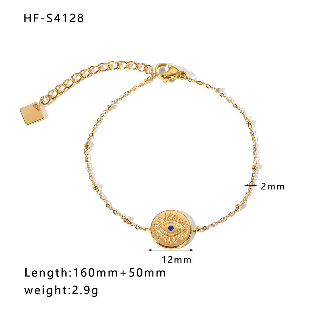 Bracciale vintage con farfalla e ciondolo rotondo in acciaio inossidabile con intarsio di strass e dettagli in perle