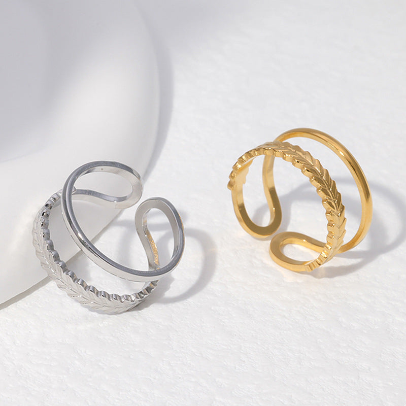 Anello aperto in acciaio inossidabile a forma di foglia minimalista da donna con finitura placcata