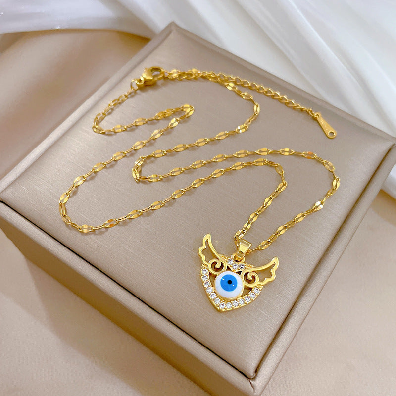 Collana girocollo di lusso a cuore e ali da donna in acciaio al titanio con finitura placcata, design geometrico, motivo luna, catena delicata