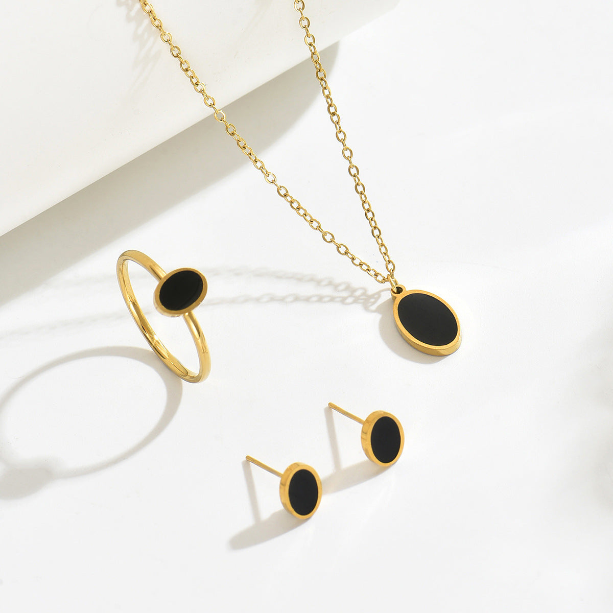 Geometric Style Copper Pendant Necklace Set with Earrings and Bracelet for Women Featuring Micro-Pave Setting and Round Design