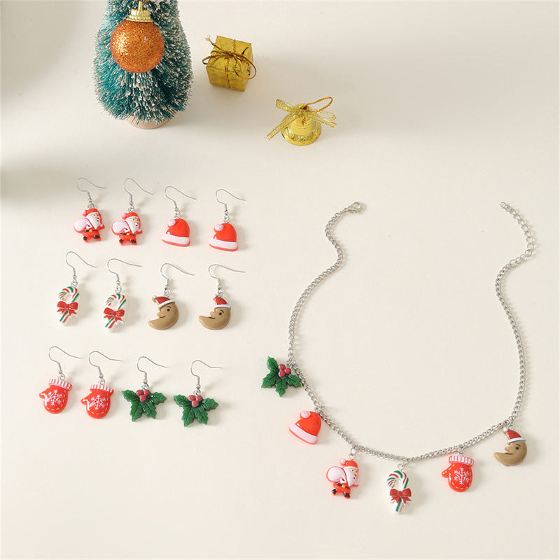Set di collana e orecchini a tema natalizio con ciondolo di Babbo Natale in metallo e design a cappello di Babbo Natale per bambini