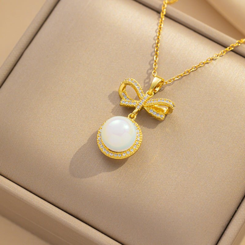 Elegante collana con ciondolo a fiocco e perla da donna in acciaio al titanio con finitura galvanica, leggera e ipoallergenica