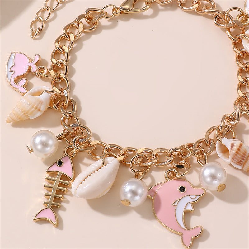 Pulsera de resina en forma de estrella con dijes de temática marina para niñas de 6 a 10 años