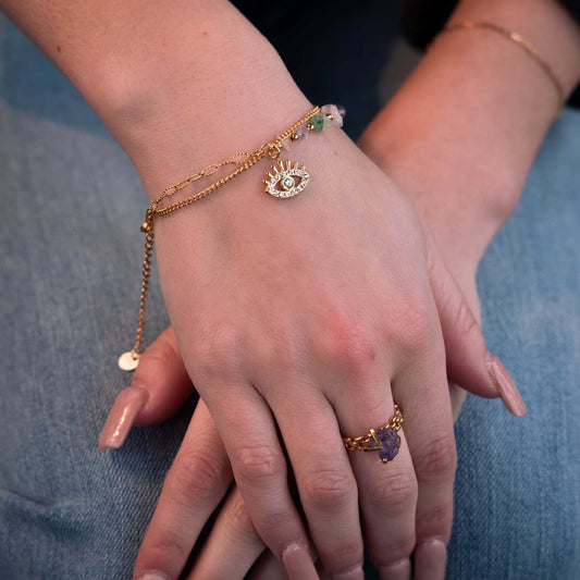 Elegante pulsera de acero inoxidable con forma de ojo, incrustaciones de circonitas y baño de oro de 18K para mujer