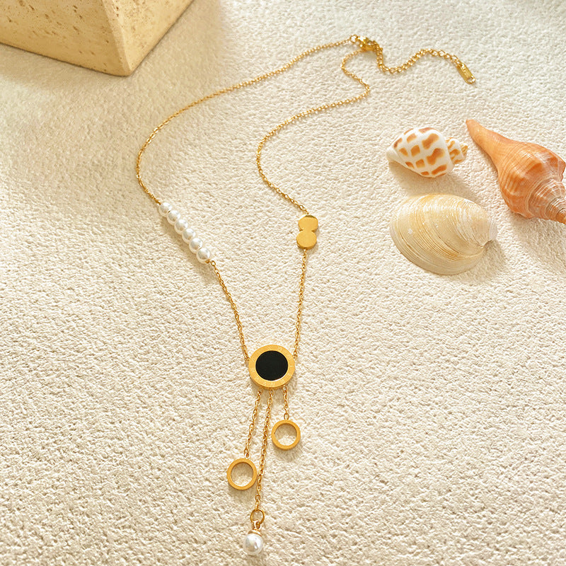 Hollow Four-Leaf Clover Tassel Titanium Steel Necklace