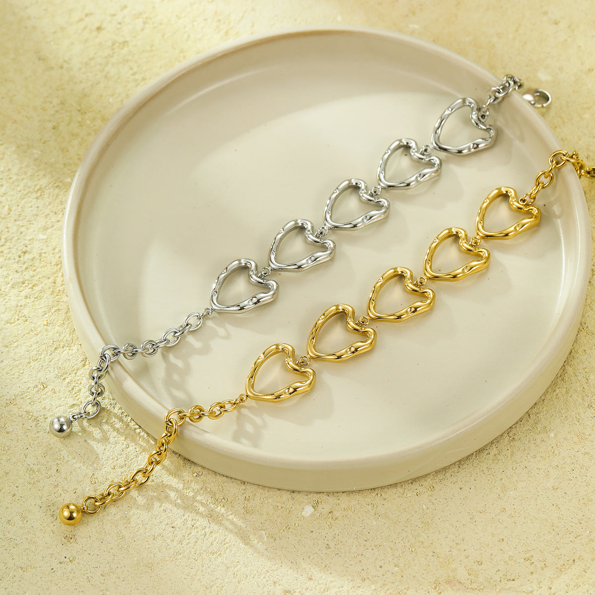 Minimalist Cool-Tone Irregular Hollow Heart OT Clasp Bracelet for Women Stainless Steel Plated Bracelet for Daily Wear and Office Use