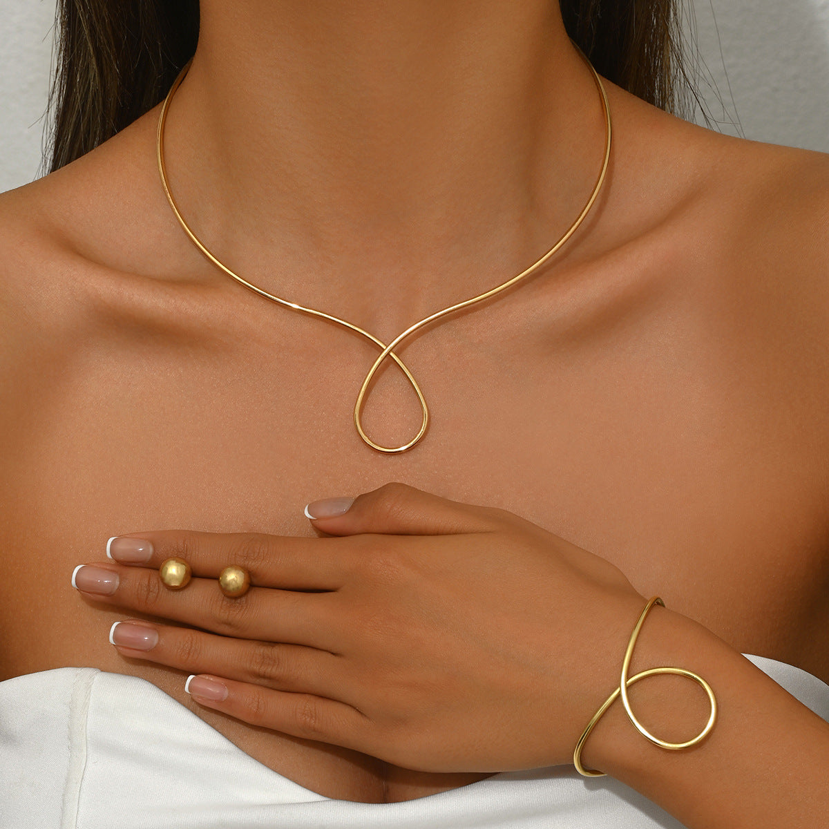 Conjunto de pendientes y collar de aleación con incrustaciones de diamantes de imitación para mujer, con diseño de corazón y lazo, a la moda