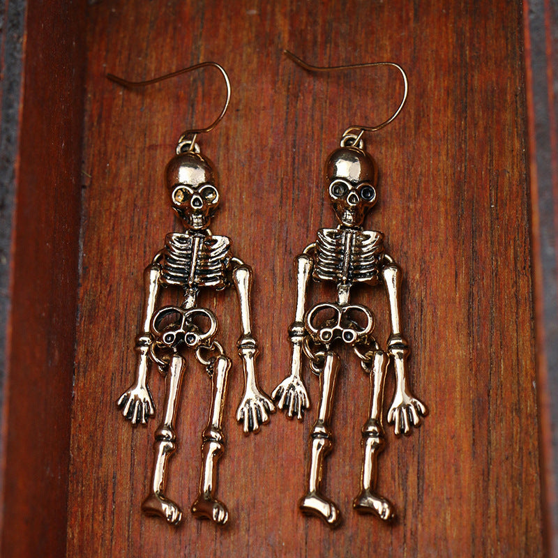 Aretes de aro con calavera de esqueleto estilo punk para mujer, con construcción de aleación y acabado galvanizado