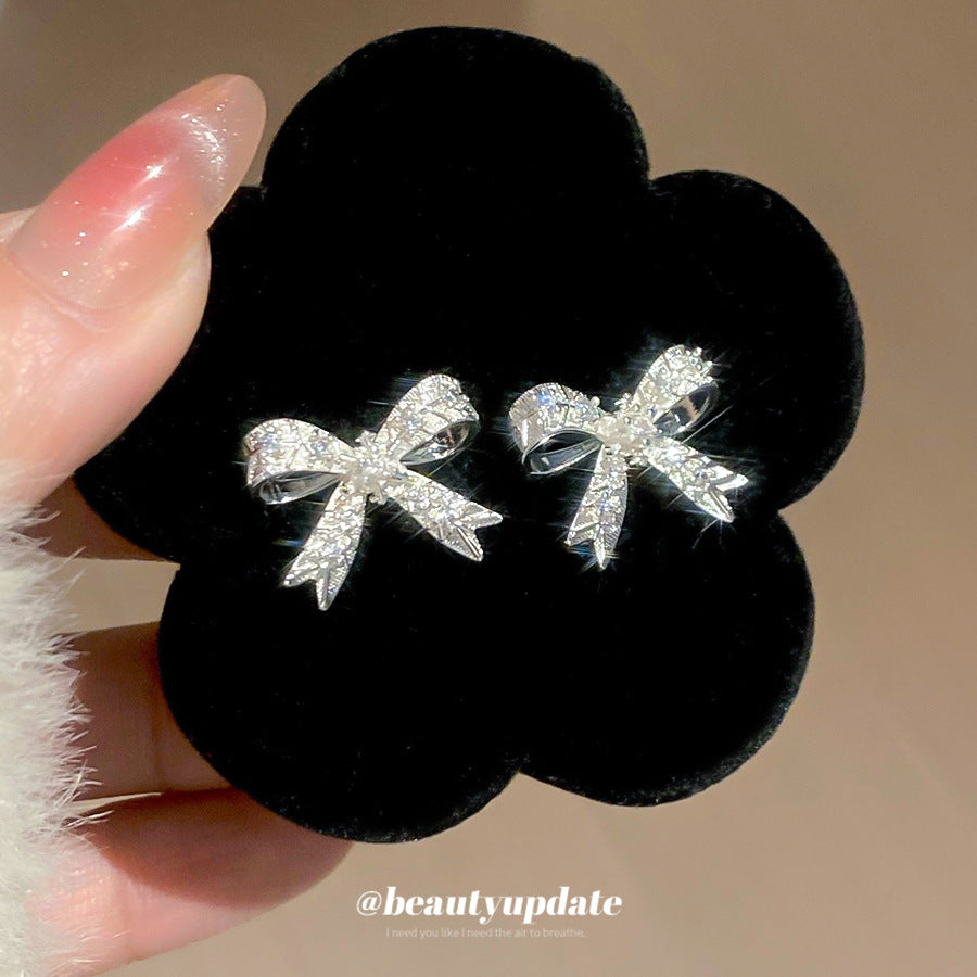 Pendientes minimalistas en forma de lazo con incrustaciones de circonita cúbica en latón y acero inoxidable para mujer, estilo lujoso y elegante