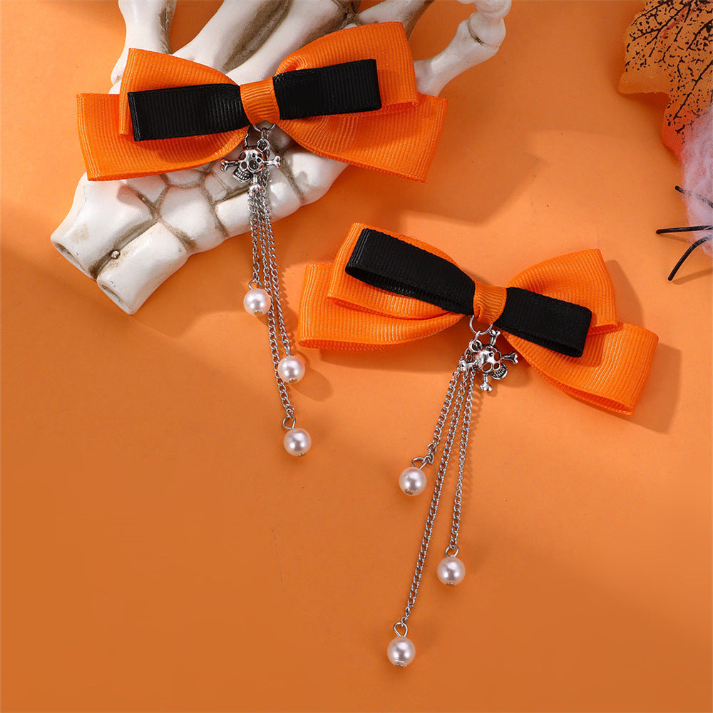 Precioso juego de pinzas para el pelo de niña con forma de lazo, cadena con borla y detalles de perlas