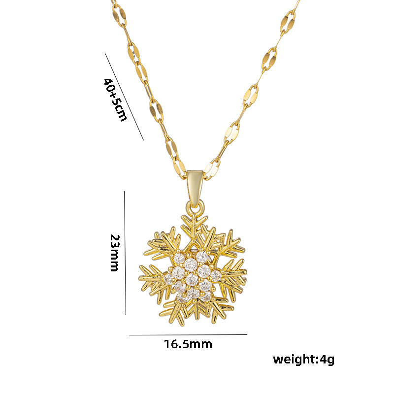 Collana con ciondolo a fiocco di neve girevole da donna in acciaio al titanio con intarsio di strass su catena ondulata