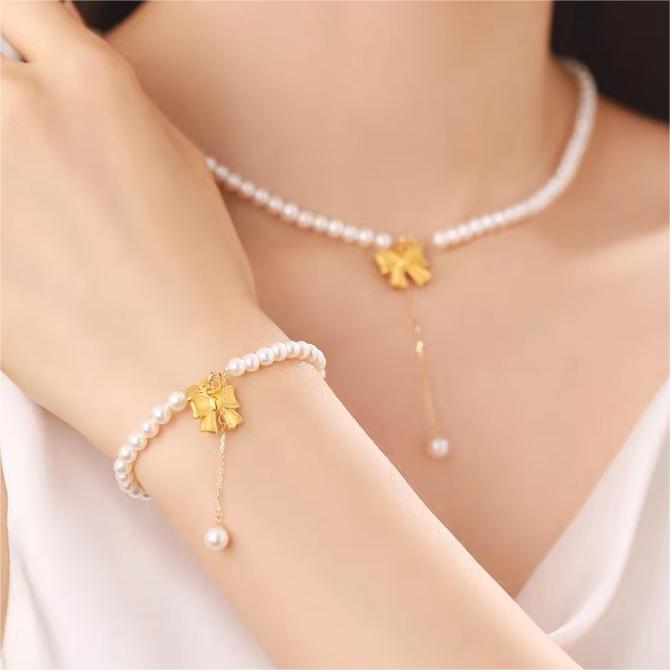 Butterfly Bow Pendant Necklace for Women with Imitation Pearl Accents, Copper Pendant, Plated Finish, Delicate Clavicle Chain, Minimalist Original Design