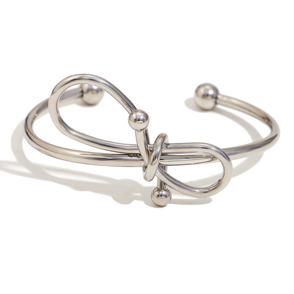 Bracciale da donna in acciaio inossidabile placcato oro 18K con fiocco, stile minimalista e alla moda