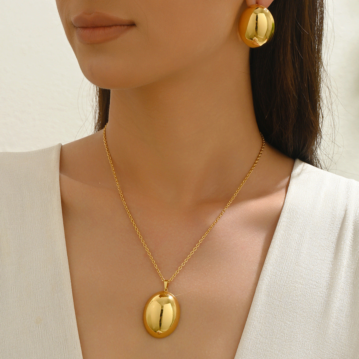 Set collana con ciondolo in metallo ovale e cerchio geometrico con orecchini da donna, lega con finitura galvanica