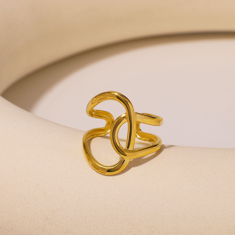 Anello asimmetrico geometrico in acciaio inossidabile placcato oro 18 carati, design avvolgente contemporaneo unisex