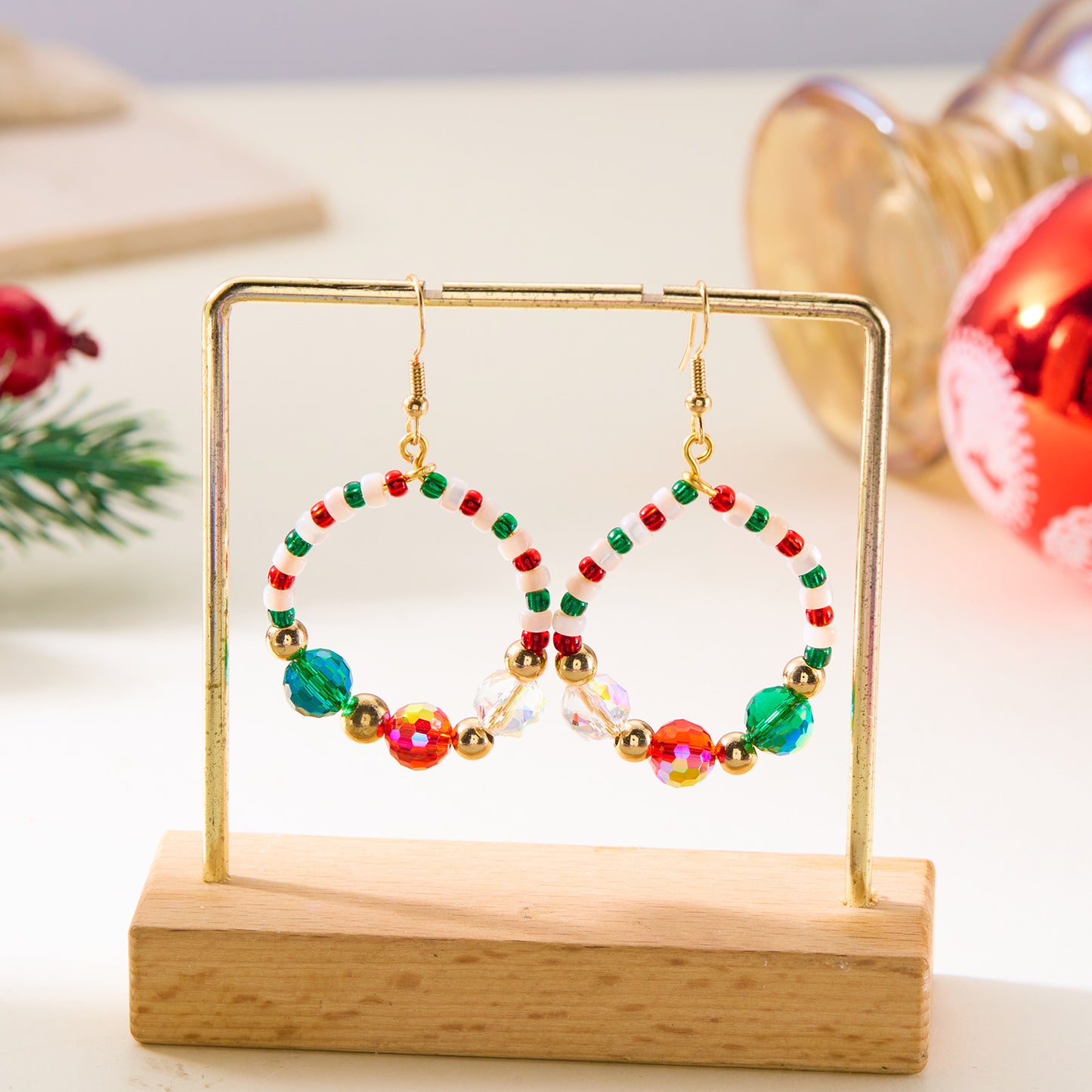 Pendientes largos asimétricos vintage con motivos navideños en pedrería y abalorios sobre base de metal chapado para mujer