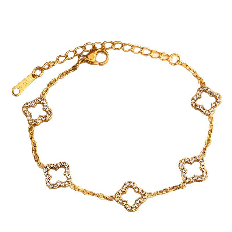 Elegante Juego de Collar de Acero Inoxidable con Trébol de Cuatro Hojas y Circonitas Cúbicas con Pulsera y Pendientes a Juego para Mujer