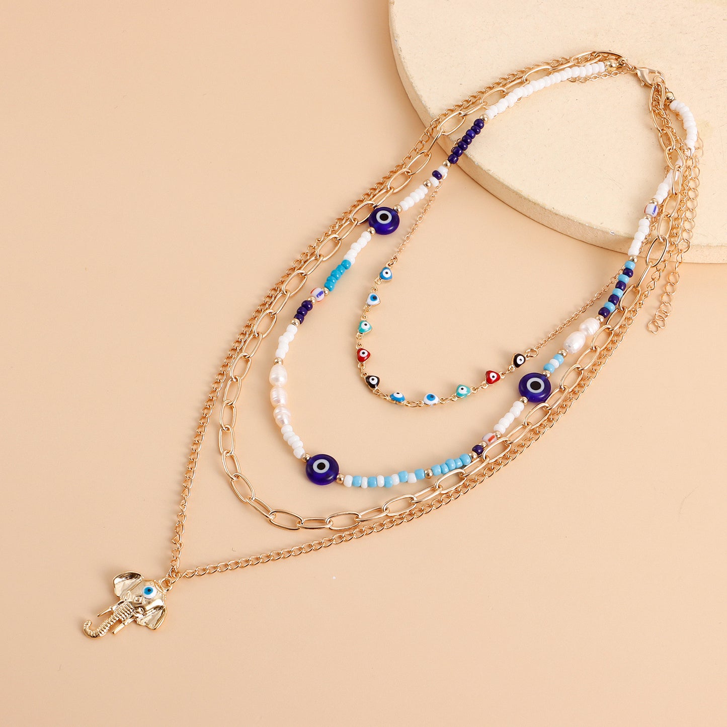 Bohemian Multi-Layer Heart-Shaped Evil Eye Beaded Necklace for Women with Alloy Pendant and Plated Finish