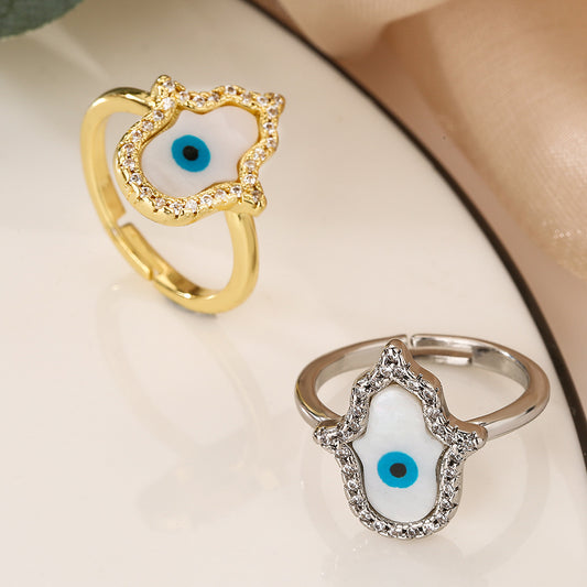 Anello da donna minimalista geometrico in rame placcato oro con micro-pavé di zirconi a forma di occhio turco