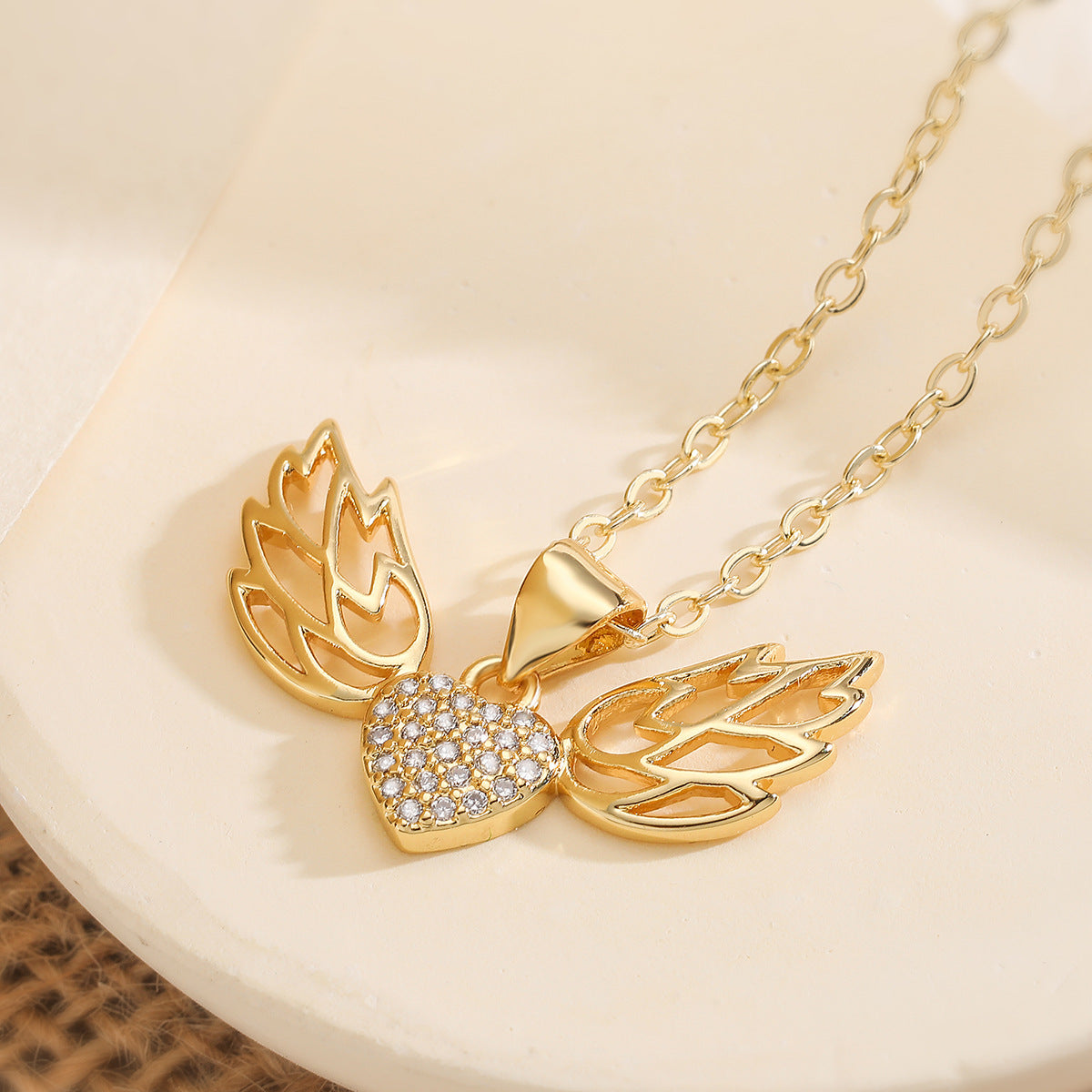 Minimalist 18K Gold Plated Brass Heart Wing Pendant Necklace with Cubic Zirconia for Women