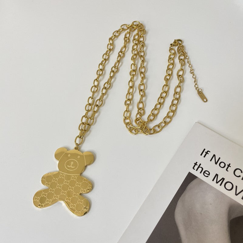 Collana con ciondolo a orso minimalista in acciaio al titanio con finitura placcata, catena a onda d'acqua, design geometrico, accessorio di moda unisex